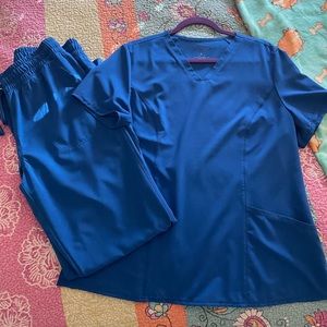Allura by Cherokee Scrubs. Large top, medium bottoms.